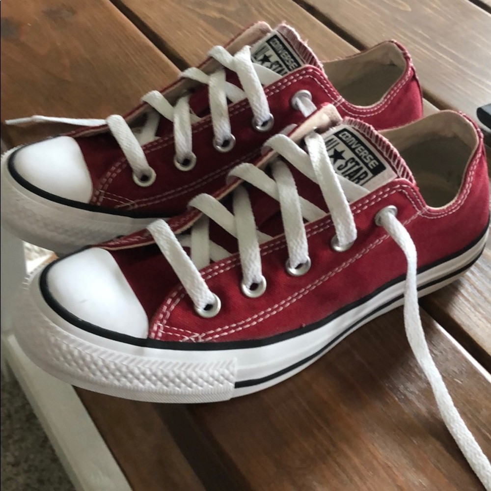 Red Converse low rise chuck taylor all star shoes